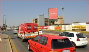 Billboards on Road M68 situated on Chris Hani Hospital, Soweto with outdoor advertising, township, highway, urban, digital, taxi rank, prices, rates, costs, rental, woodlands and marketing