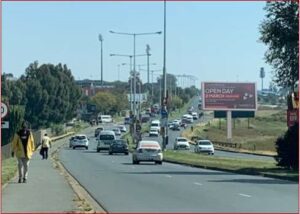 Billboards on Chris Hani road near the UJ University campus with outdoor advertising, township, highway, urban, digital, taxi rank, prices, rates, costs, rental, woodlands and marketing
