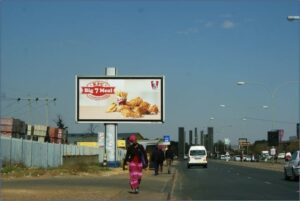 Billboards on Road Reserve in front of Erf 2, Klipspruit Ext 318, Soweto with outdoor advertising, township, highway, urban, digital, taxi rank, prices, rates, costs, rental, woodlands and marketing