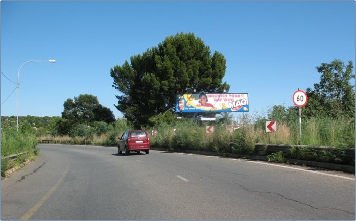Billboards on Guild Cottage, viewed from Barry Hertzog, Empire Road with outdoor advertising, township, highway, urban, digital, taxi rank, prices, rates, costs, rental, woodlands and marketing