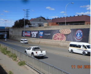 Billboards on Dr Belcher Road Mangaung with outdoor advertising, township, highway, urban, Outdoor Static, taxi rank, prices, rates, costs, rental, woodlands, and marketing