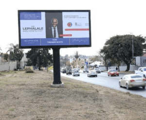 Billboards on Rivonia Road Wedge Shopping Center with outdoor advertising, township, highway, urban, Outdoor Static, taxi rank, prices, rates, costs, rental, woodlands, and marketing