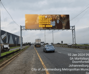 Billboards on M2 Highway from Johannesburg CBD Germiston with outdoor advertising, township, highway, urban, Outdoor Static, taxi rank, prices, rates, costs, rental, woodlands, and marketing