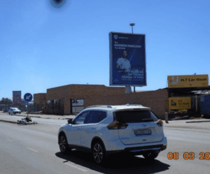 Billboards on Moshoeshoe Street Mangaung Mangaung with outdoor advertising, township, highway, urban, Outdoor Static, taxi rank, prices, rates, costs, rental, woodlands, and marketing