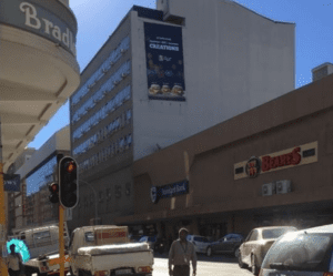 Billboards on Charlotte Maxeke Street LT Trust Building with outdoor advertising, township, highway, urban, Outdoor Static, taxi rank, prices, rates, costs, rental, woodlands, and marketing