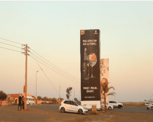 Billboards on Vaal Monateng Cafe Gauteng with outdoor advertising, township, highway, urban, Outdoor Static, taxi rank, prices, rates, costs, rental, woodlands, and marketing