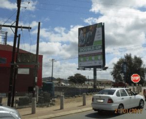 Billboards on Monument Road Giyani with outdoor advertising, township, highway, urban, Outdoor Static, taxi rank, prices, rates, costs, rental, woodlands, and marketing
