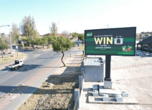Billboards on Vilakazi Street Kwa Lichaba with outdoor advertising, township, highway, urban, Outdoor Static, taxi rank, prices, rates, costs, rental, woodlands, and marketing