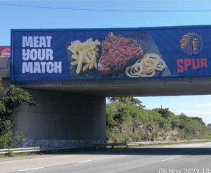 Billboards on NorthEast Expressway East London with outdoor advertising, township, highway, urban, Outdoor Static, taxi rank, prices, rates, costs, rental, woodlands, and marketing