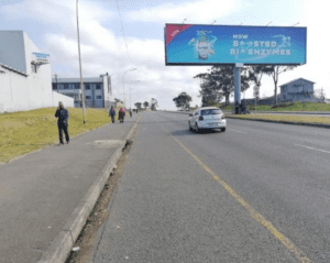 Billboards on Northwest Express Way Duncan Village with outdoor advertising, township, highway, urban, Outdoor Static, taxi rank, prices, rates, costs, rental, woodlands, and marketing