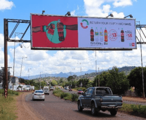 Billboards on Thohoyandou entrance Sibasa with outdoor advertising, township, highway, urban, Outdoor Static, taxi rank, prices, rates, costs, rental, woodlands, and marketing