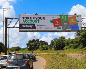 Billboards on Thohoyandou exit Sibasa with outdoor advertising, township, highway, urban, Outdoor Static, taxi rank, prices, rates, costs, rental, woodlands, and marketing