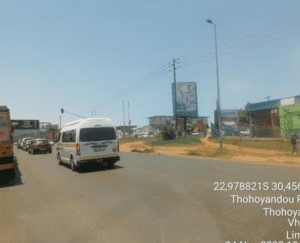 Billboards on Thohoyandou Road Sibasa with outdoor advertising, township, highway, urban, Outdoor Static, taxi rank, prices, rates, costs, rental, woodlands, and marketing