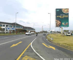 Billboards on Bonza Bay Road Beacon Bay Retail Park with outdoor advertising, township, highway, urban, Outdoor Static, taxi rank, prices, rates, costs, rental, woodlands, and marketing