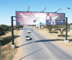 Billboards on Nelson Mandela Drive Mahikeng with outdoor advertising, township, highway, urban, Outdoor Static, taxi rank, prices, rates, costs, rental, woodlands, and marketing